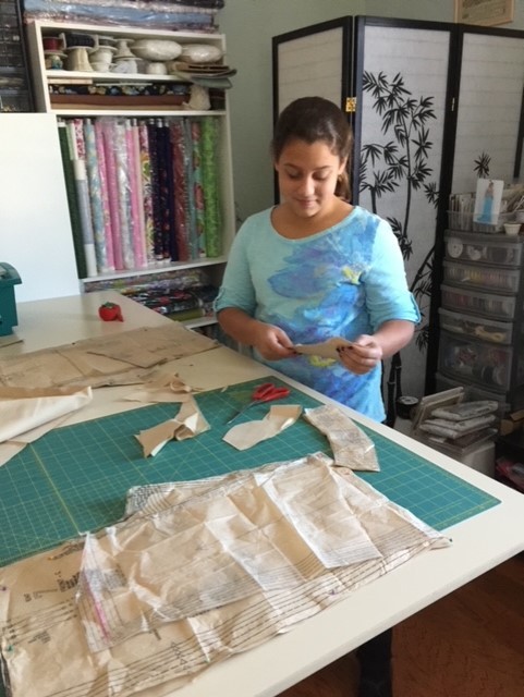 Little Girl Participating Sewing Lessons