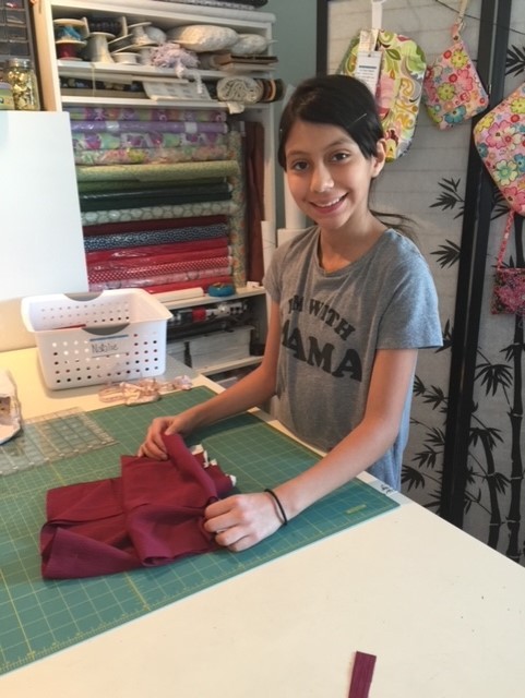 Girl Attending Sewing Class